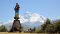 Religious monument with Mt Huascaran (6785 meters high) the highest peak in the Peruvian Andes