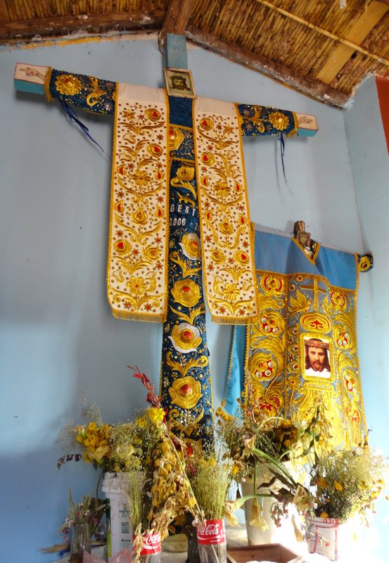 Brocade crosses in church in Ollantaytambo