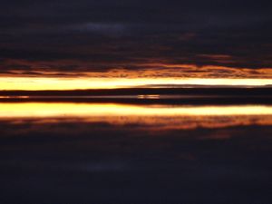 Sunrise reflected in the salt flats
