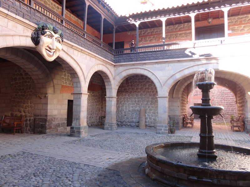 The fountain and mask within casa Nacional de Moneda