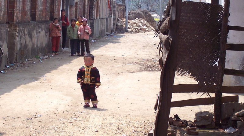 Little boy in tiny local village