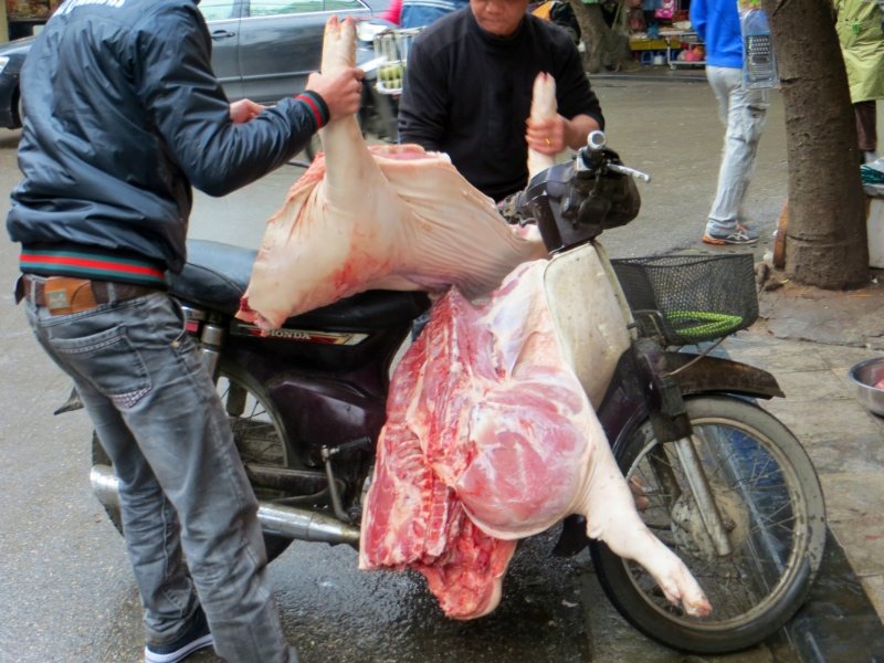 Delivering meat to the footpath butcher