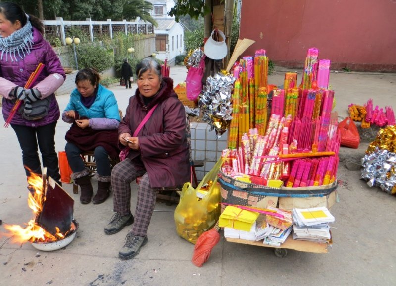 Selling incense at the temple