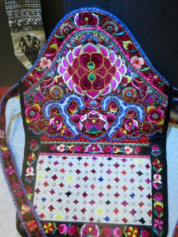 Embroidered baby carrier, used widely in Yunnan Province