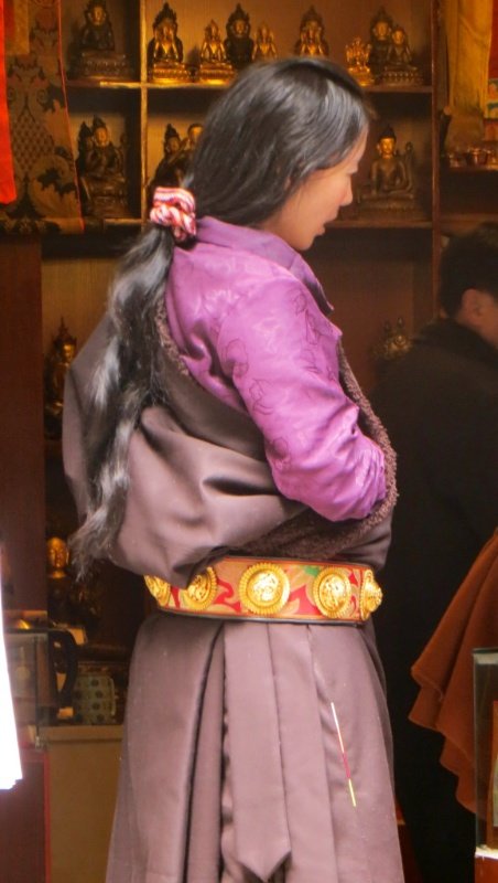 Tibetan woman - love the belt...