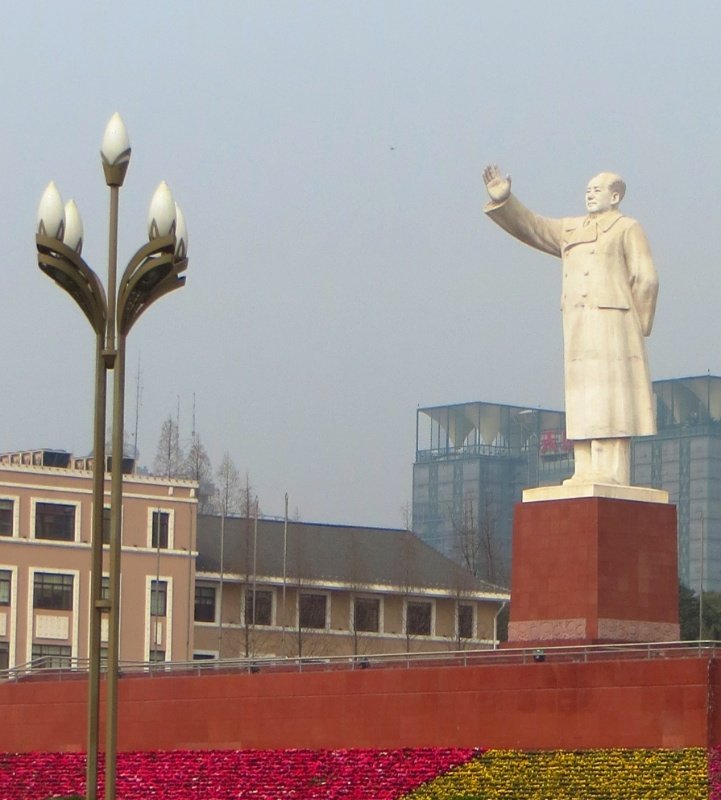 Mao hailing one of the impossible to get taxis