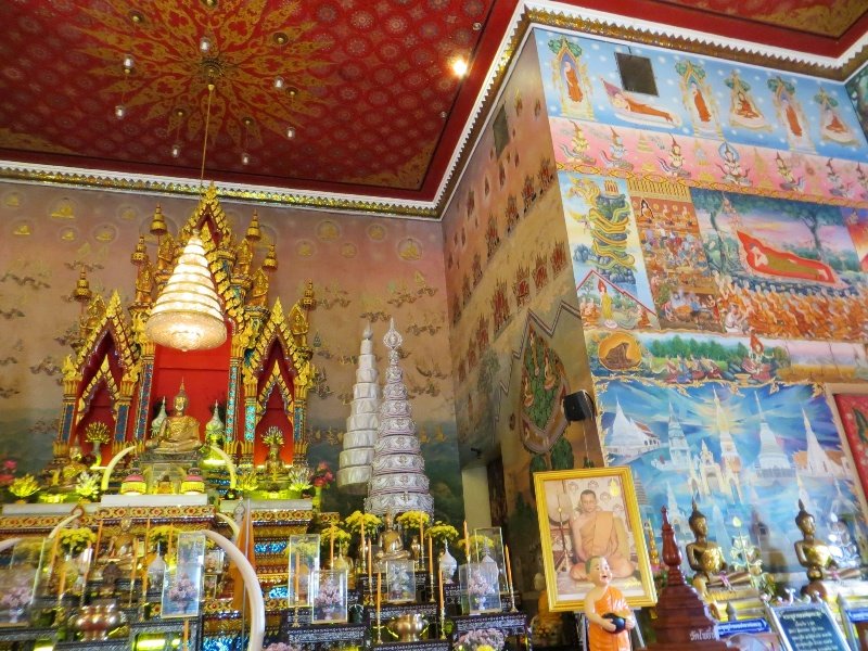 Temple walls and main altar at Wat Pho Chai
