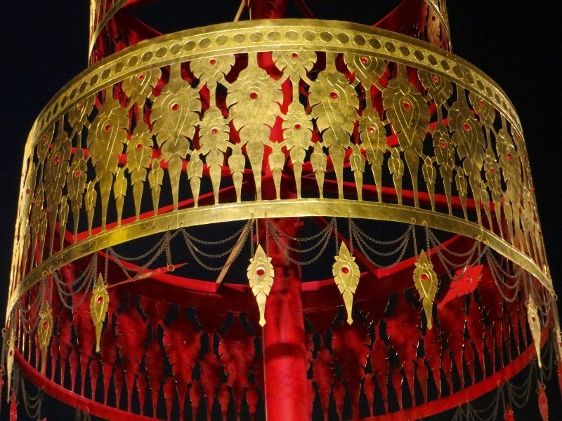 Red and gold temple umbrella at the Wat
