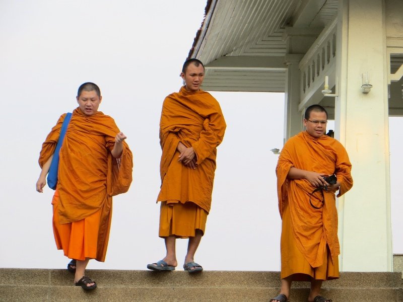 Monks enjoying the view of the Mekong River in Mukdahan