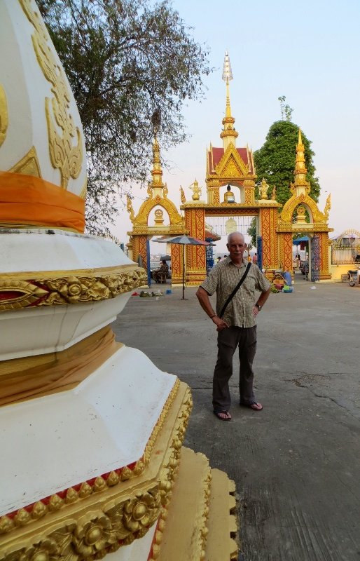 Jerry surrounded by gilded cement in the streets of Mukdahan