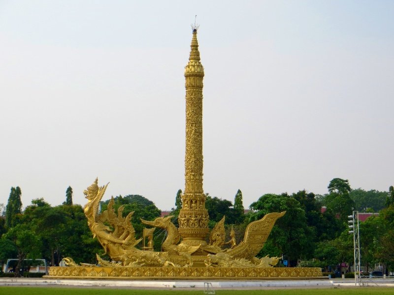Large golden candle statue in the park of Ubon Ratchathani