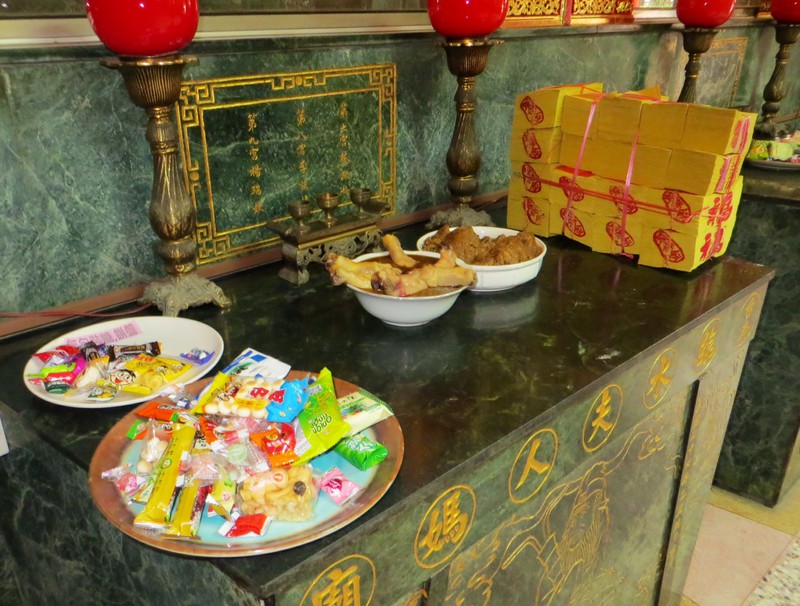 Temple offerings within Lady Linshui's temple where women go to ask Lady Lishui to protect their children.