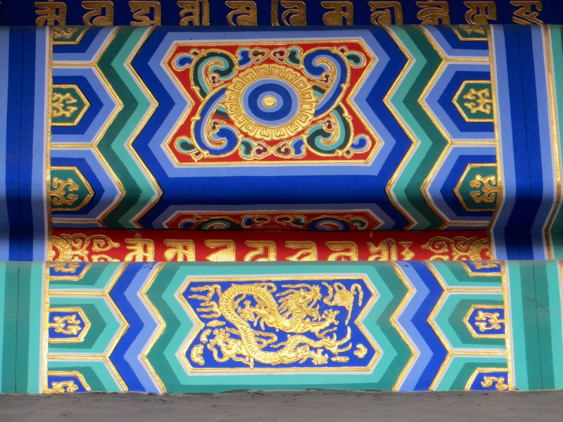 Exterior beam paint decoration within the Llama Temple