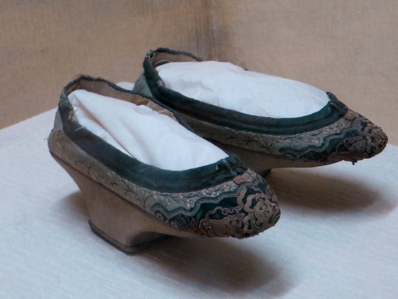 Can you imagine walking in these? Shoes on display in Silk Museum