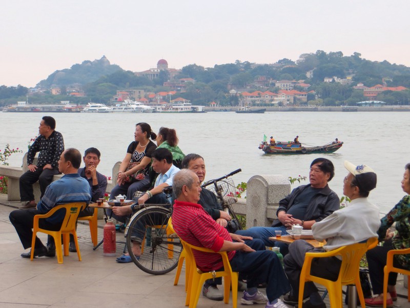 Locals enjoying a chat over tea - waterfront overlooking Gulang Yu