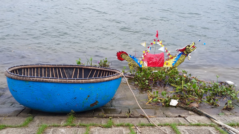 A coracle and paper good luck boat at Duy Hai fishing village