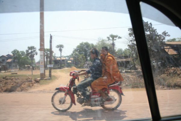 monks on a moto