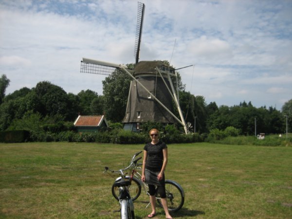 Jane with a bike and a windmill