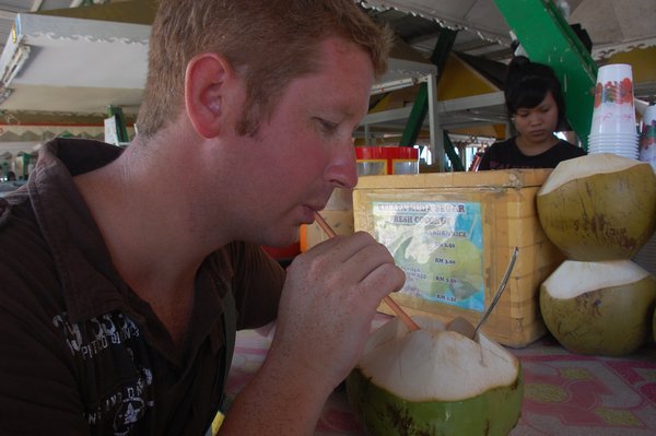 Drinking a Coconut