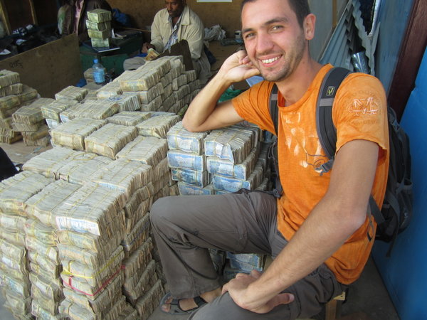 Tim With Stacks Of Cash