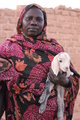 Sudanese Woman & Baby Goat