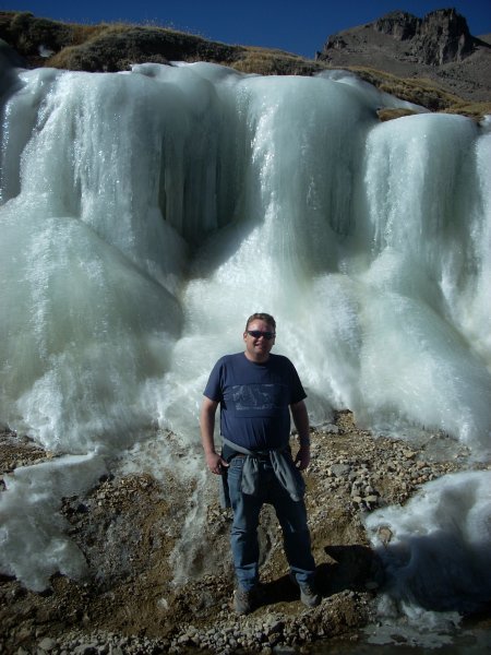 A Glacier with a strange bloke standing in front