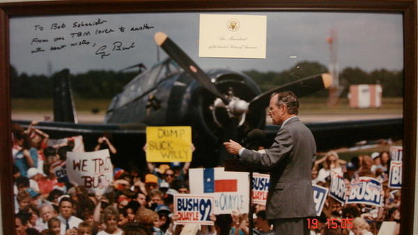 President Bush during campaign with Grumman TBF Avenger he flew in background