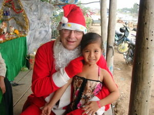 Santa and a cute little girl