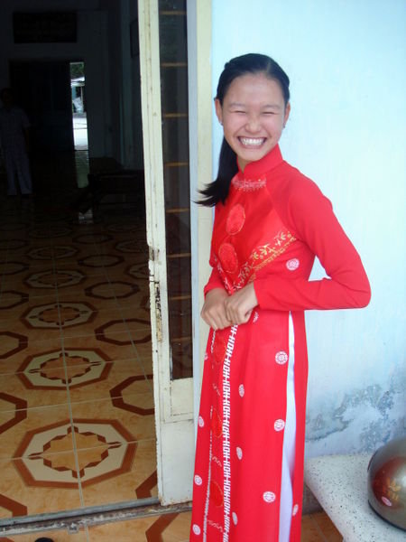 Miss Hoa, a bigger smile