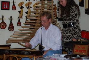 Tom and Vietnamese instrument