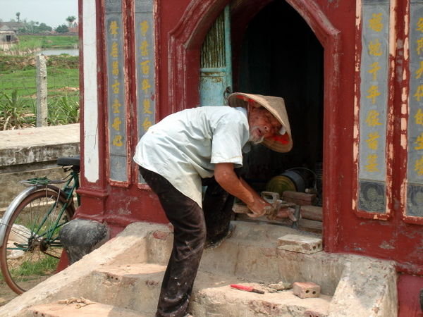 96 old man working on his tomb