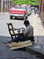 Recaning a chair in San Miguel