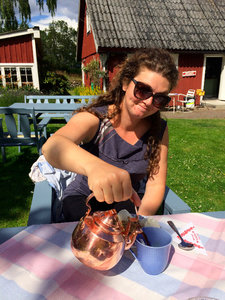Coffee comes by the pot at this "fika" spot in the sun!