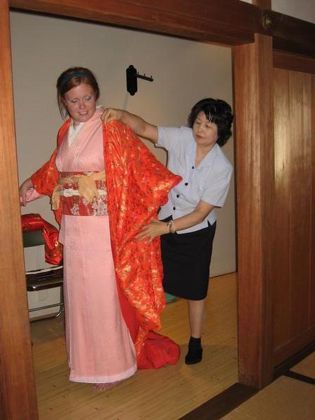 getting dressed in a kimono