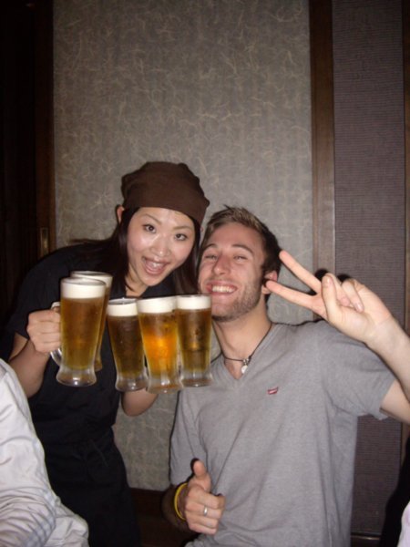 Beer toting Japanese woman