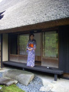Woman in Kimono near garden
