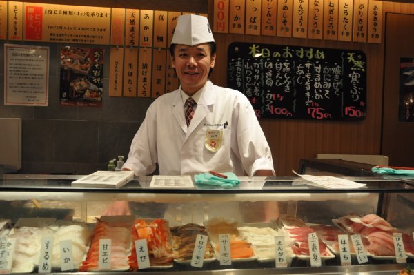 Standing Sushi Chef in Standing Sushi Bar