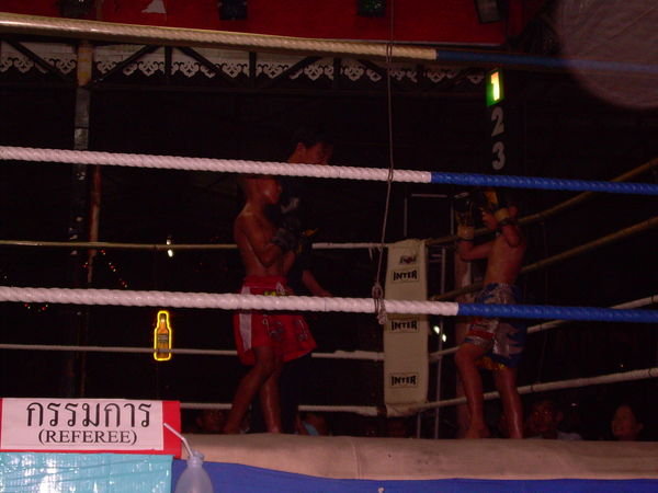 Kids of about 7 at the Muai Thai! The guy in Red whooped his ass!