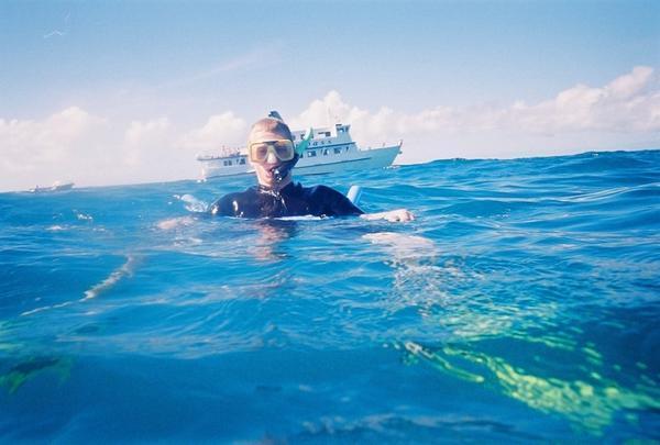 Graeme snorkelling (with the cruise boat behind us)
