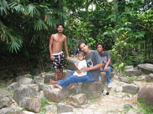 A little family enjoying the waterfall