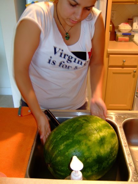 Lauren Deals to a Watermelon