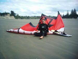 Helena with kite at Orewa beach