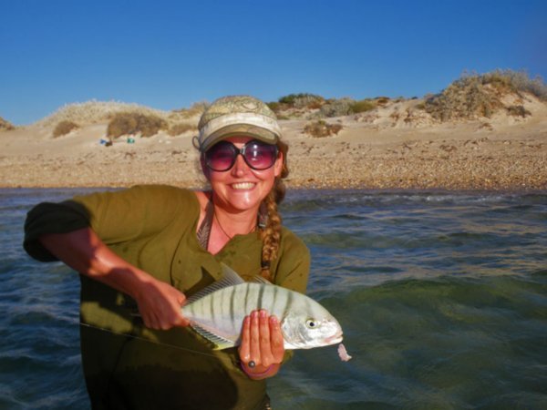 Janine's first fish, a golden trevally