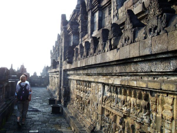 Murals in Borobodur. The ones on the right tell the story after the reincarnation, on the left is the story of before.
