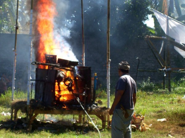 Cremation Ceremony III, helping the fire along with big gas burners