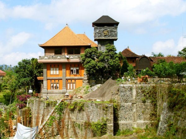 No, this is not the nazi fortress from Wolfenstein. It's Ratu Bagus' Ashram near Rendang, Bali. The suncross is quite common on Bali and sometimes confusing to Europeans