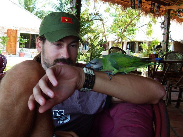 What is it with me and parrots? This one was 'wild' in Sihanoukville and decided it liked my bracelet.