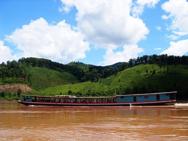 Same boat as ours, cruising through the rapids on the Mekong