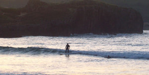 Surfers in Noja