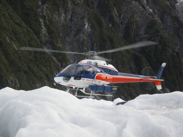 Helicopter landing on the glacier